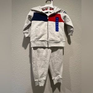 Brand new two piece Tommy Hilfigier toddler jogger suit.